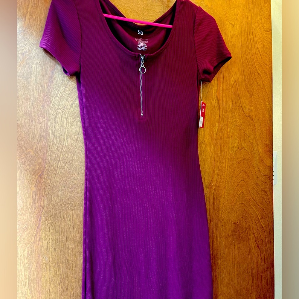 Junior size XS dress. Stretch material. New with tag.